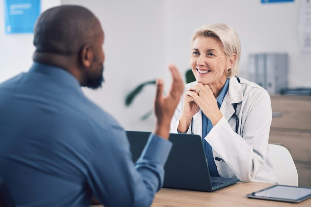FAQs doctor consulting with a patient